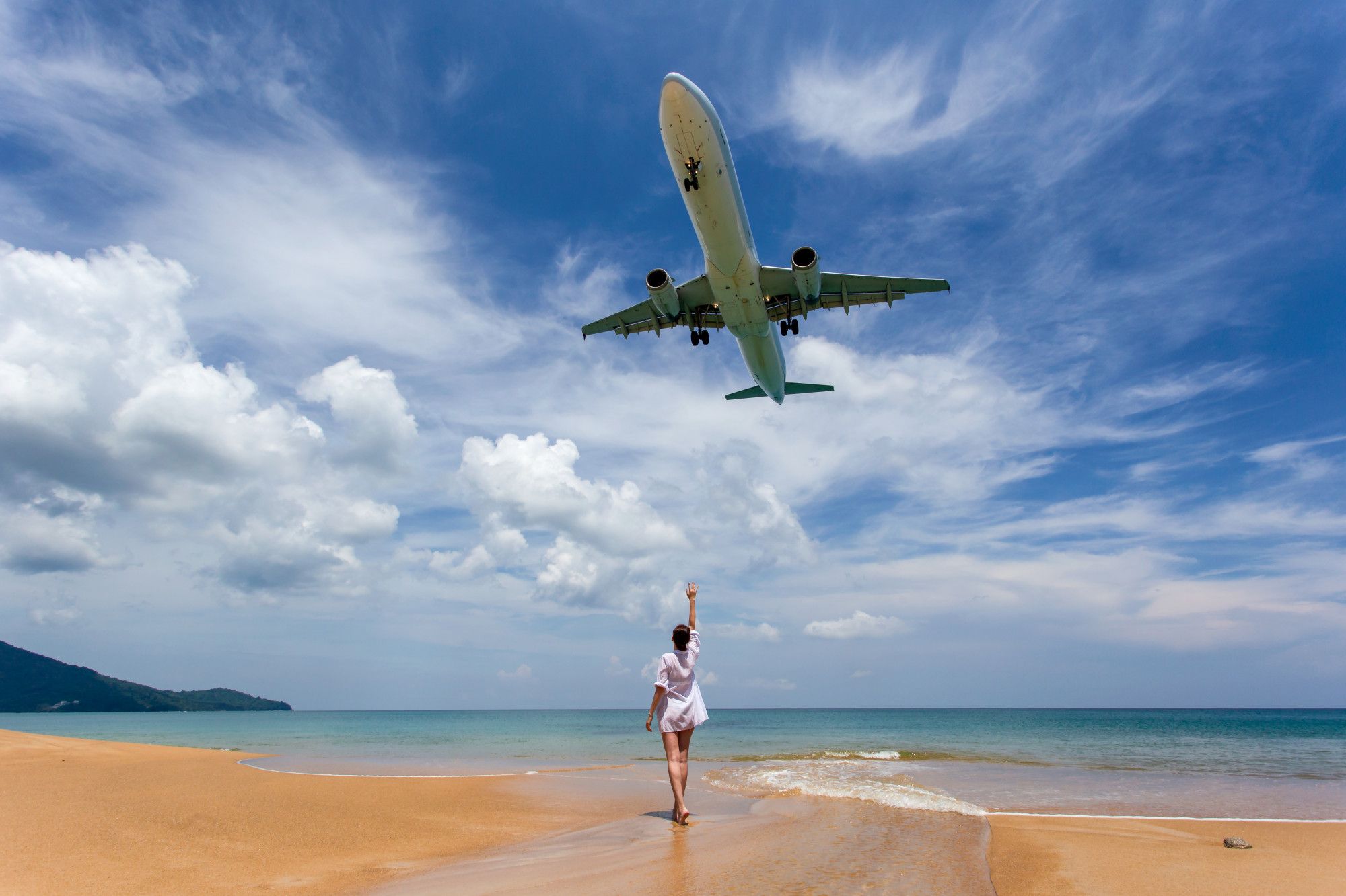 A person points to a landing airplane on Mai Khao Beach in Phuket, Thailand
https://www.freepik.com/premium-photo/portrait-beautiful-woman-beach-mai-khao-beach-phuket_4820334.htm#fromView=search&page=1&position=24&uuid=3fab22c2-92be-4de7-b44f-aa73c8619daa