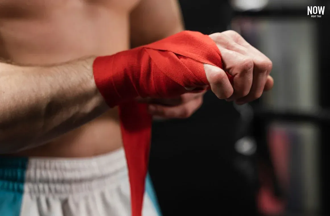 Close-up of hands wrapped with Muay Thai hand wraps before training