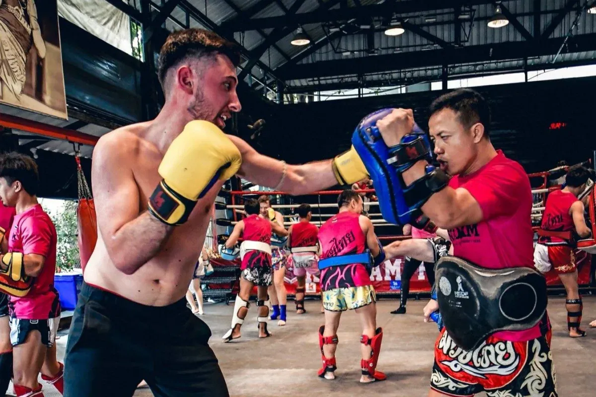 Kru Dam Muay Thai Gym group training in Bangkok, Thailand