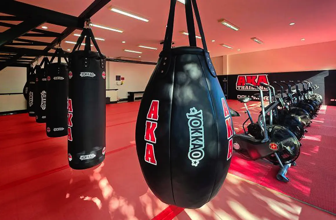 Discover AKA Thailand’s spacious gym filled with punching bags, fitness bikes, and training equipment—perfect for Muay Thai enthusiasts and travelers staying active in Thailand.
