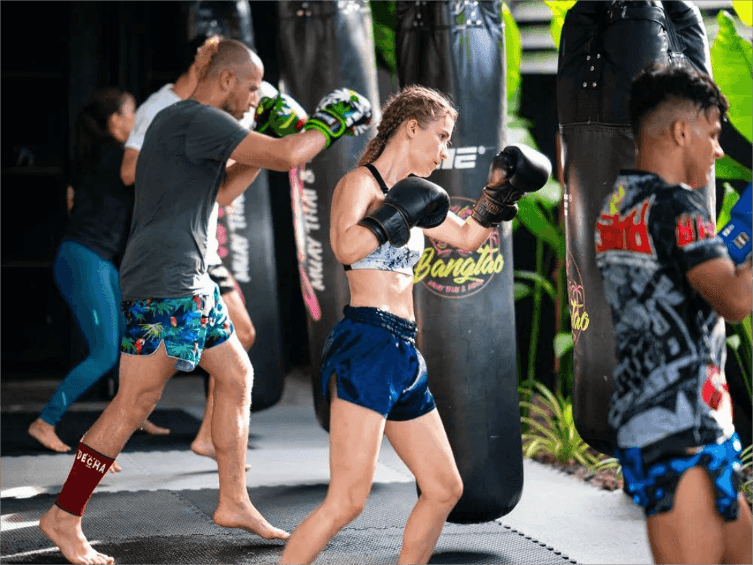 Gym goers train on the punching bag at the Bangtao Muay Thai Gym in Phuket
https://www.nowmuaythai.com/class/62-All-Inclusive-Training-1-Week#gallery2