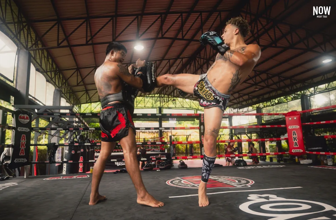 A man practicing muay thai kicks at AKA Thailand