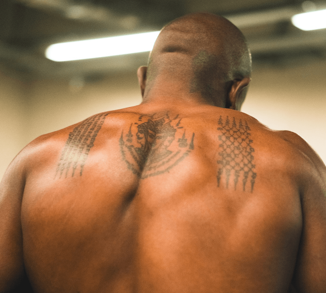 Khalil’s Yantra tattoo represents protection, power, and the warrior’s path.