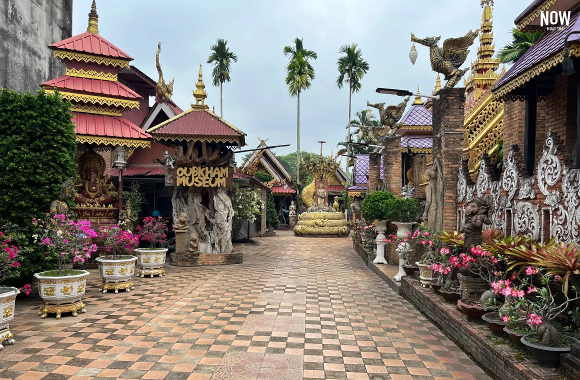 Golden Lanna-style entrance of Oub Kham Museum, Chiang Rai, Thailand, royal artifacts, historical treasures, cultural exhibition, unique collection, travel photography.
