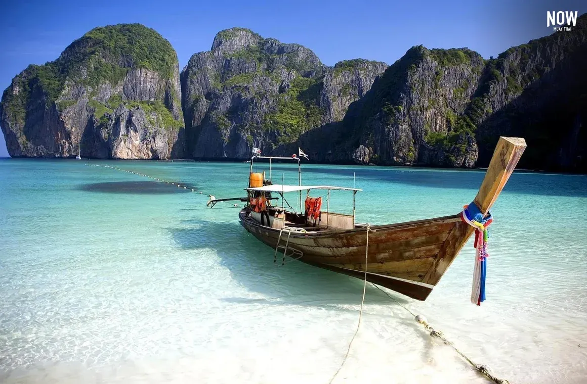 Railay Beach surrounded by limestone cliffs in Krabi