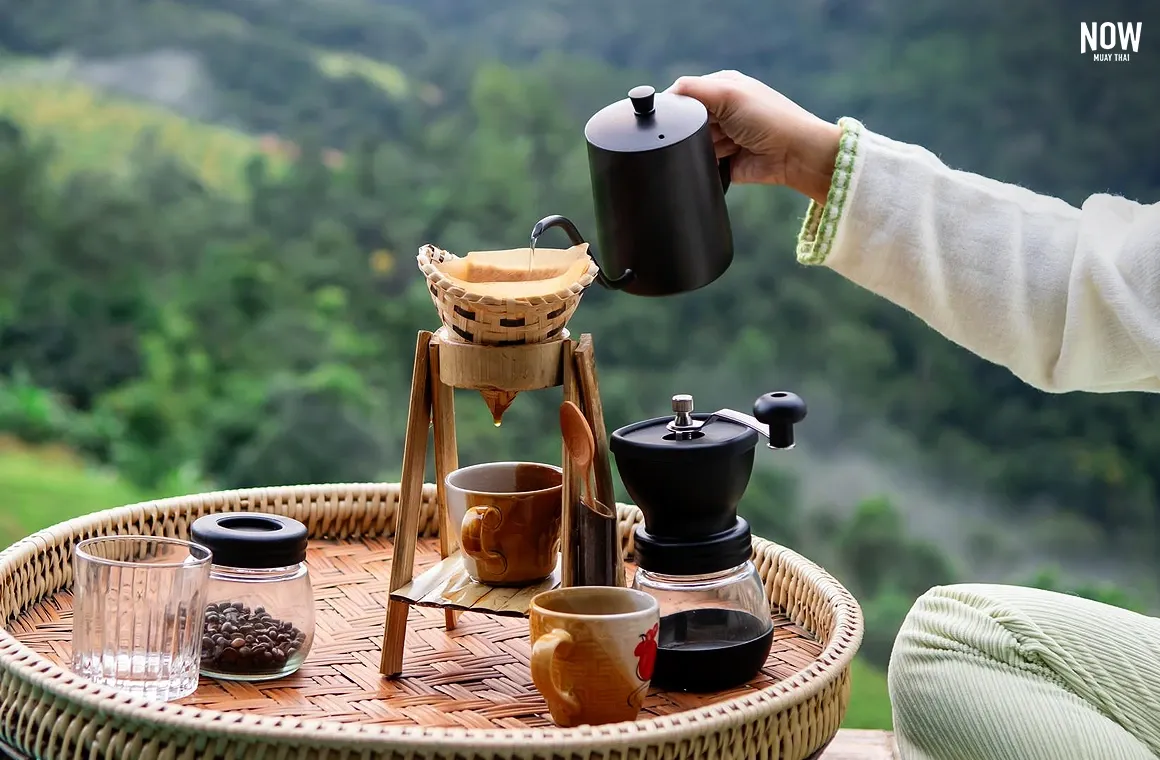 Morning coffee drip with mountain view and sea of mist in Chiang Mai, Thailand — serene café experience in nature.