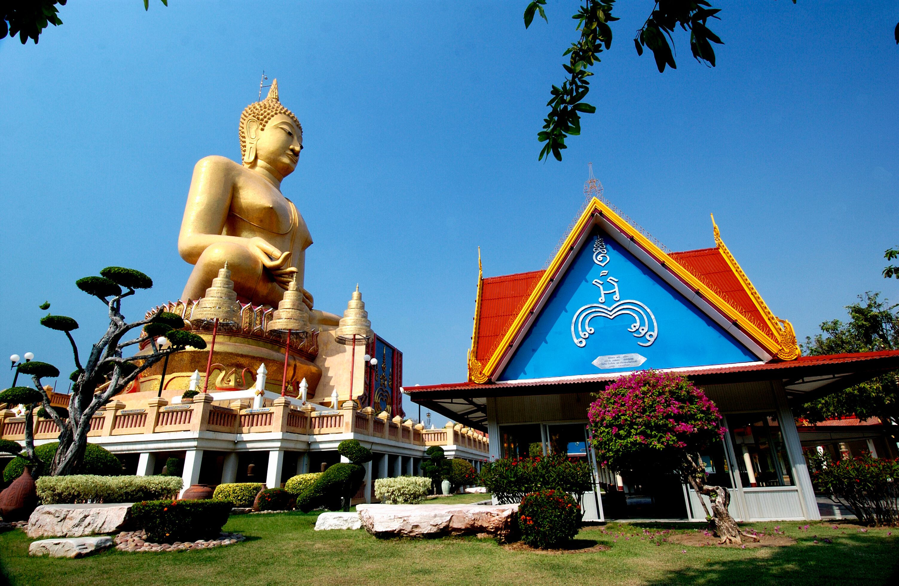 Luang Pho Yai, the largest blessing-posture Buddha image in Thailand, covered in gold mosaic at Wat Phikun Thong, Sing Buri