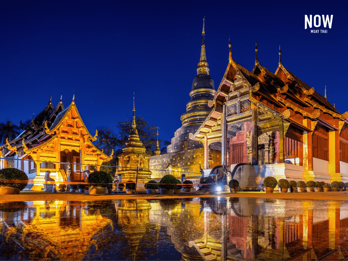 The Wat Phra Singh Temple in Chiang Mai, Thailand, lit up at night