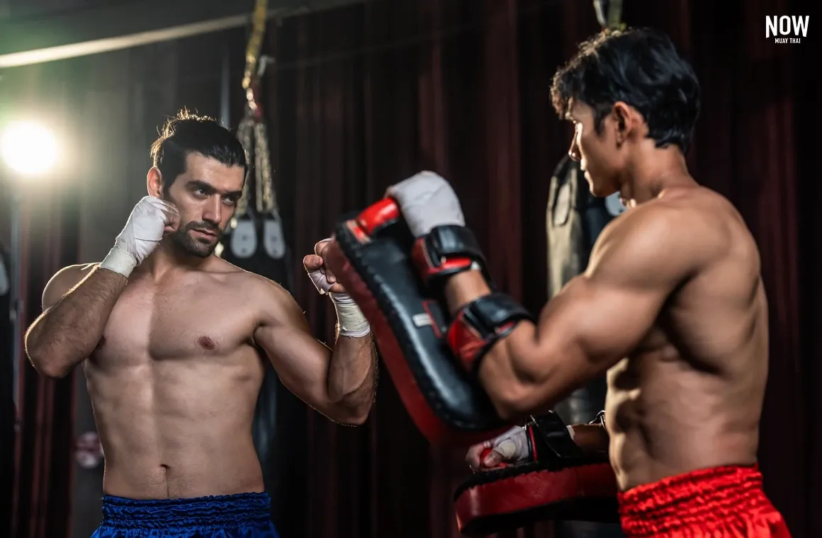 Muay Thai training session with a coach in Thailand — an approachable and popular activity for travelers