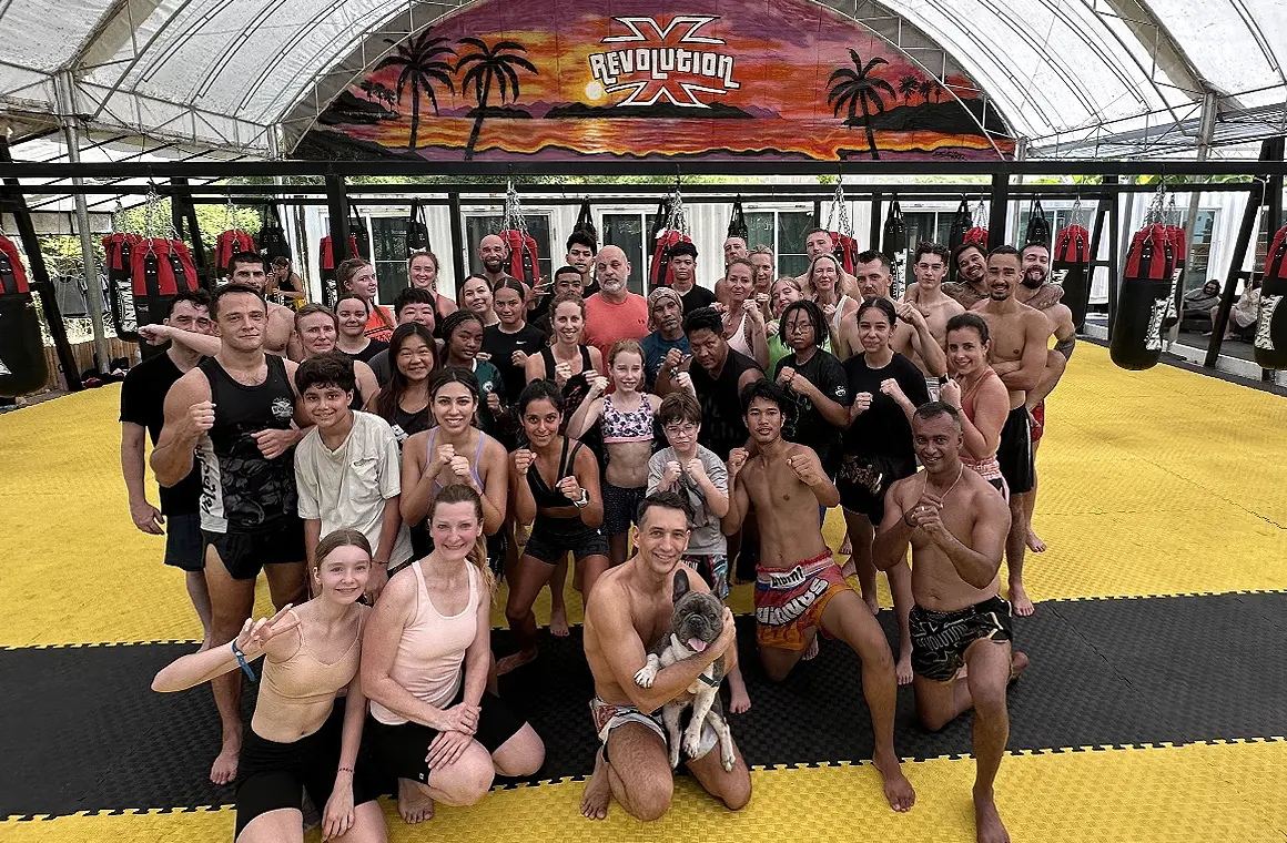 A group of Muay Thai students training at Revolution Phuket Muay Thai Camp, showcasing how effective budgeting and planning can enhance both short-term and long-term Muay Thai training adventures in Thailand.