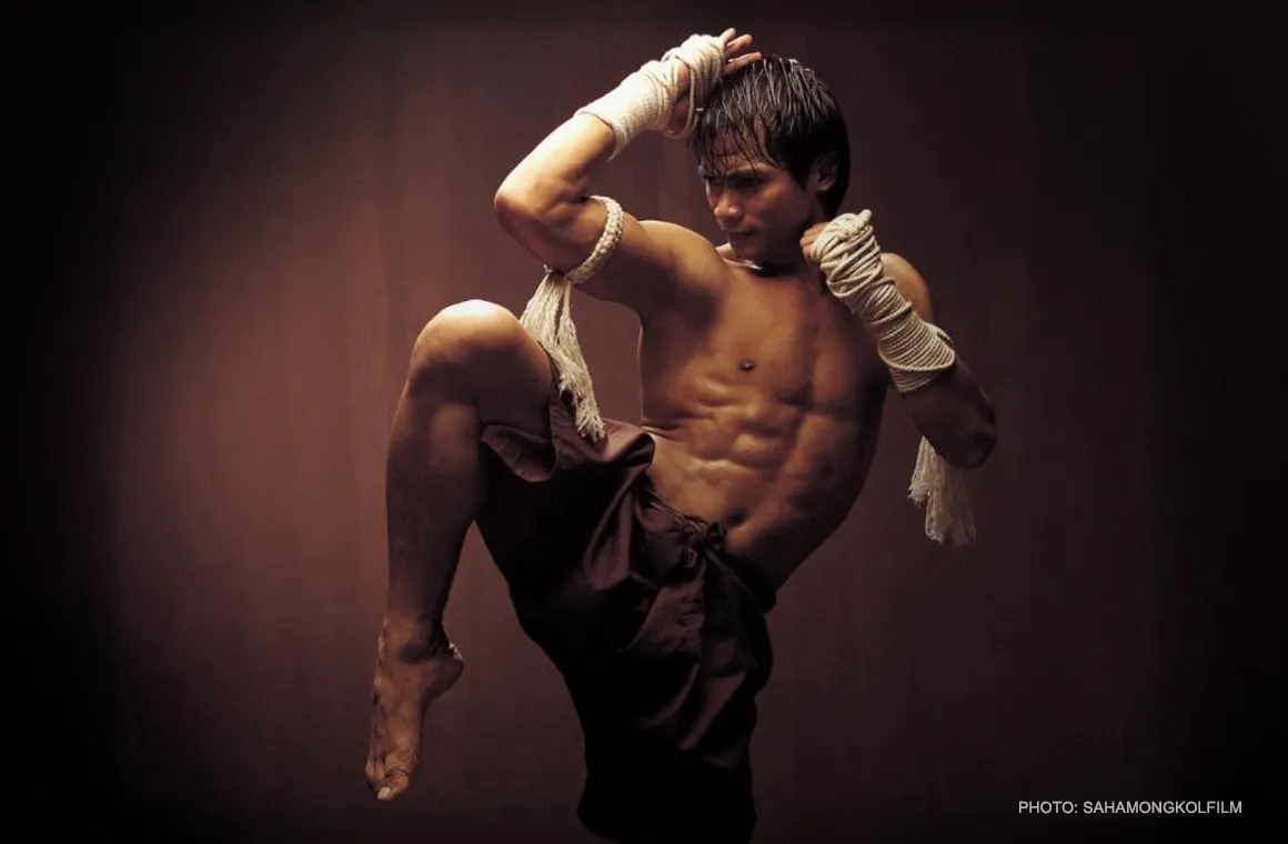 Tony Jaa performing a powerful Muay Thai move in the iconic Ong Bak movie, showcasing the beauty and effectiveness of Muay Thai's techniques. His portrayal of Muay Thai in the film has inspired global admiration for the martial art, contributing to its widespread popularity and highlighting its cultural significance