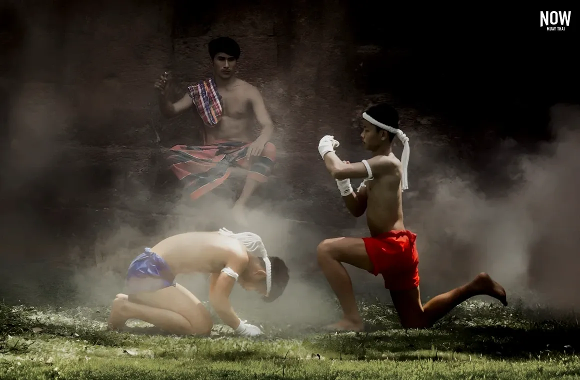 Two Muay Thai fighters bow respectfully to each other in front of their Kru (teacher) before their match, symbolizing mutual respect and the opportunity to learn and improve together.