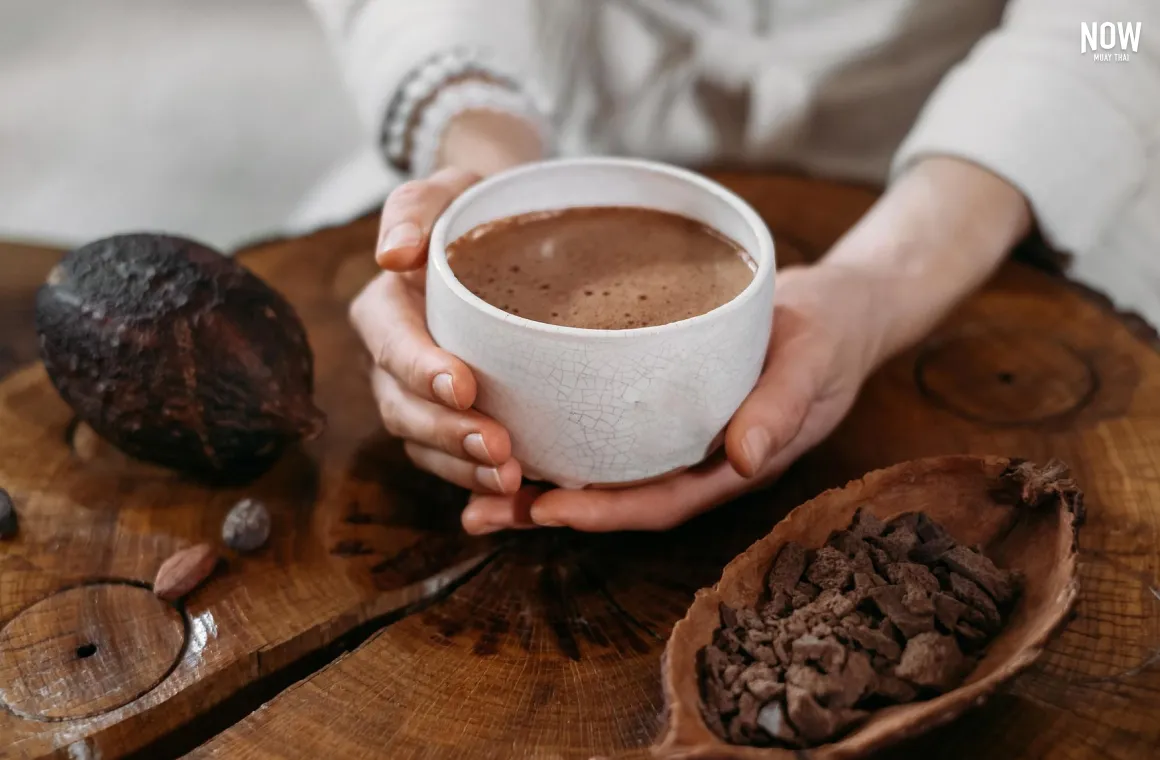 A glass of unsweetened cocoa drink, ideal for post-workout recovery with natural protein and carbs.