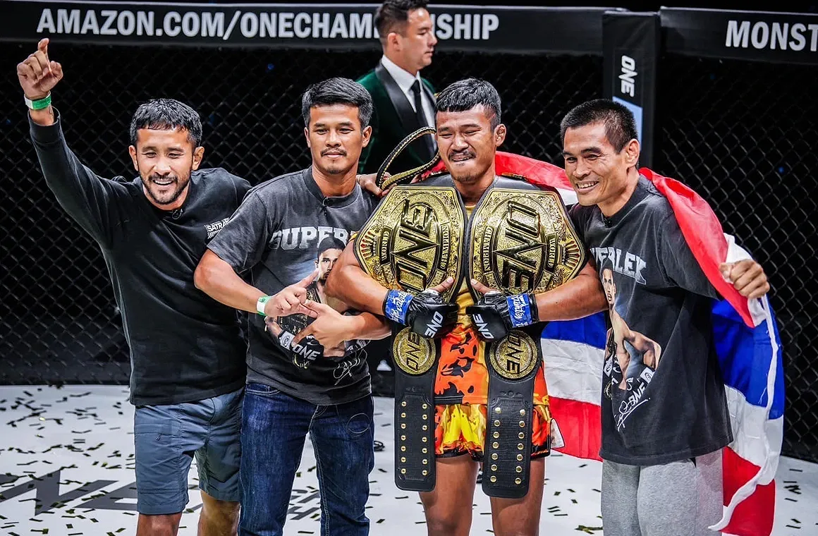 Superlek celebrates an unforgettable moment as he receives his second ONE Championship Muay Thai World Title belt after defeating Jonathan Haggerty from the United Kingdom for the Bantamweight (135-145 lbs) title on September 6, 2024.