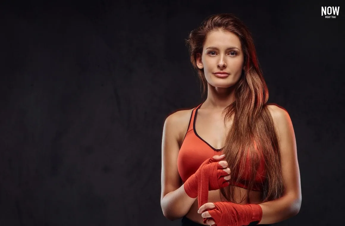 female travelers muay thai in thailand.webp