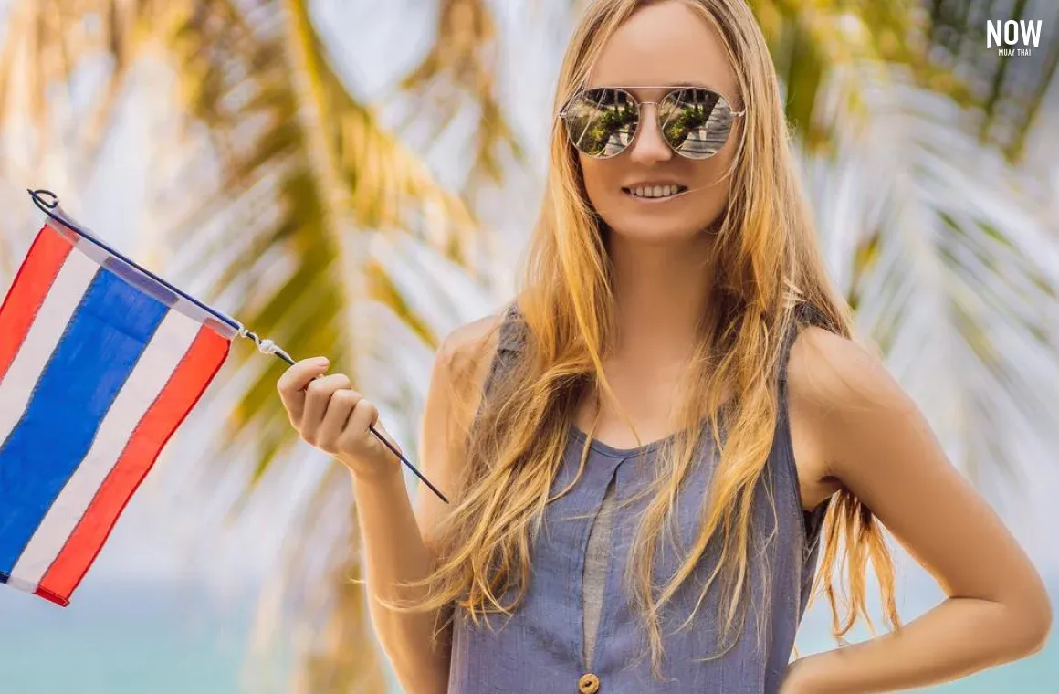 woman with thai flag.webp